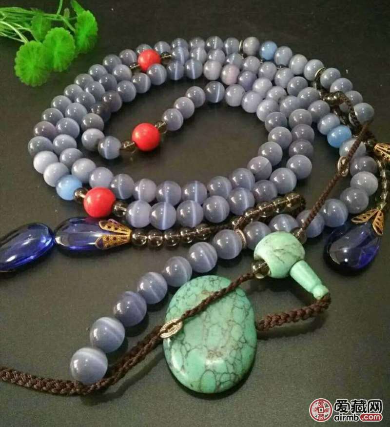 收来蓝色猫眼石朝珠一条 珊瑚水