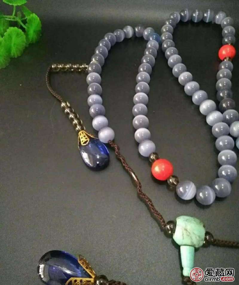 收来蓝色猫眼石朝珠一条 珊瑚水