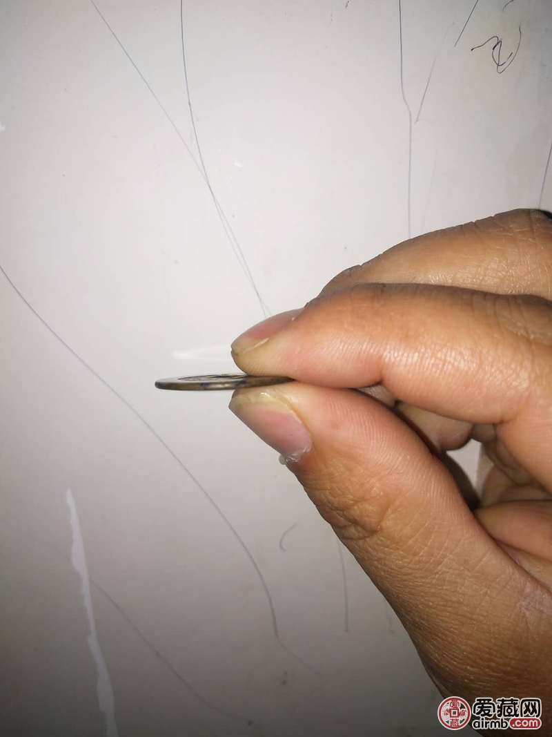 乾隆通宝一枚，请帮忙鉴定下真伪