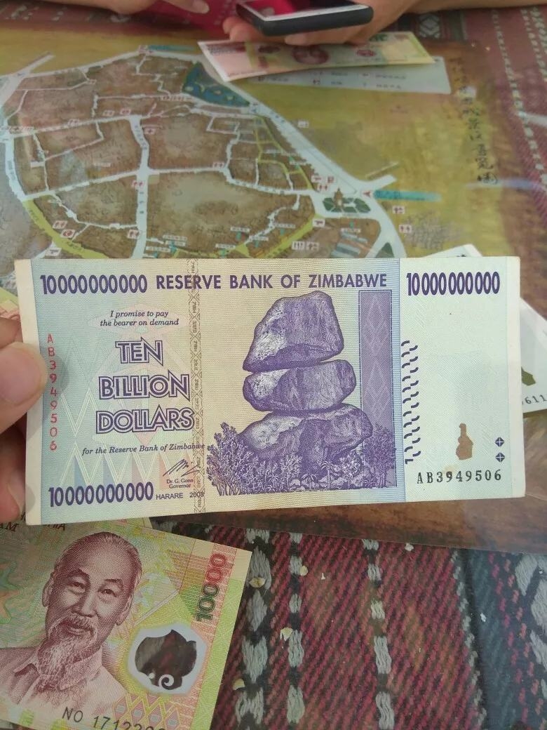 津巴布韦100亿最大面值万亿九成新单张真币号码随机