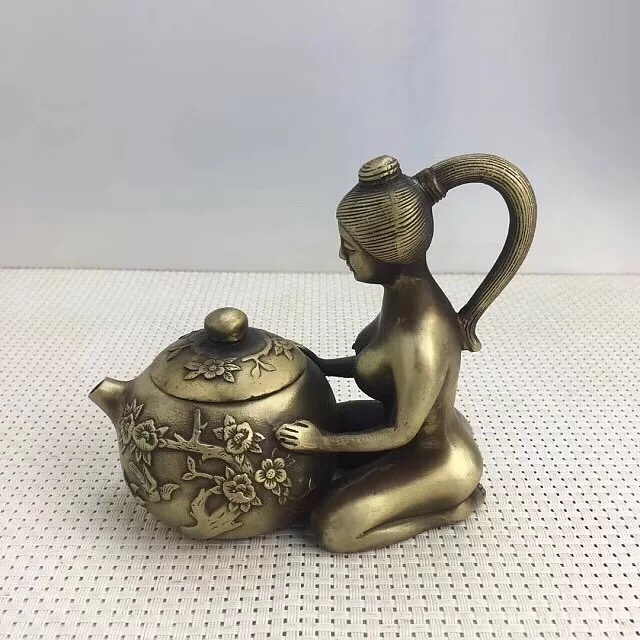 187 分享到: 纯铜摆件茶壶美女茶壶, 做工精致造型独特, 实物拍摄