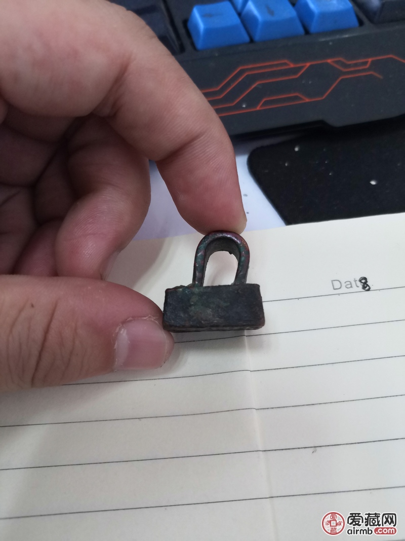 老师您好，请老师帮忙看看真假，