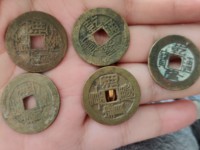 乾隆通宝背宝源雕母