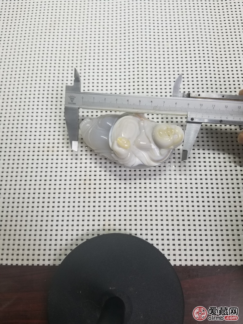 【拍品名称】俏色玛瑙手把件，（