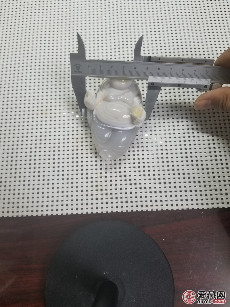【拍品名称】俏色玛瑙手把件，（