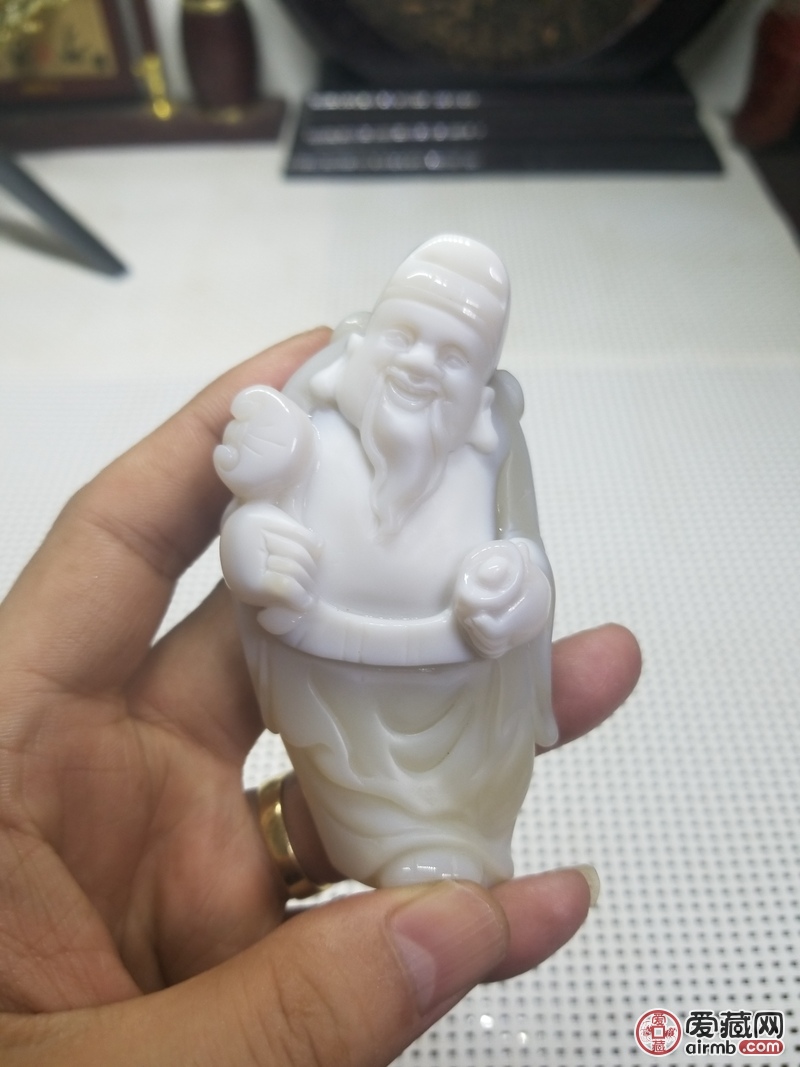 【拍品名称】俏色玛瑙手把件，（