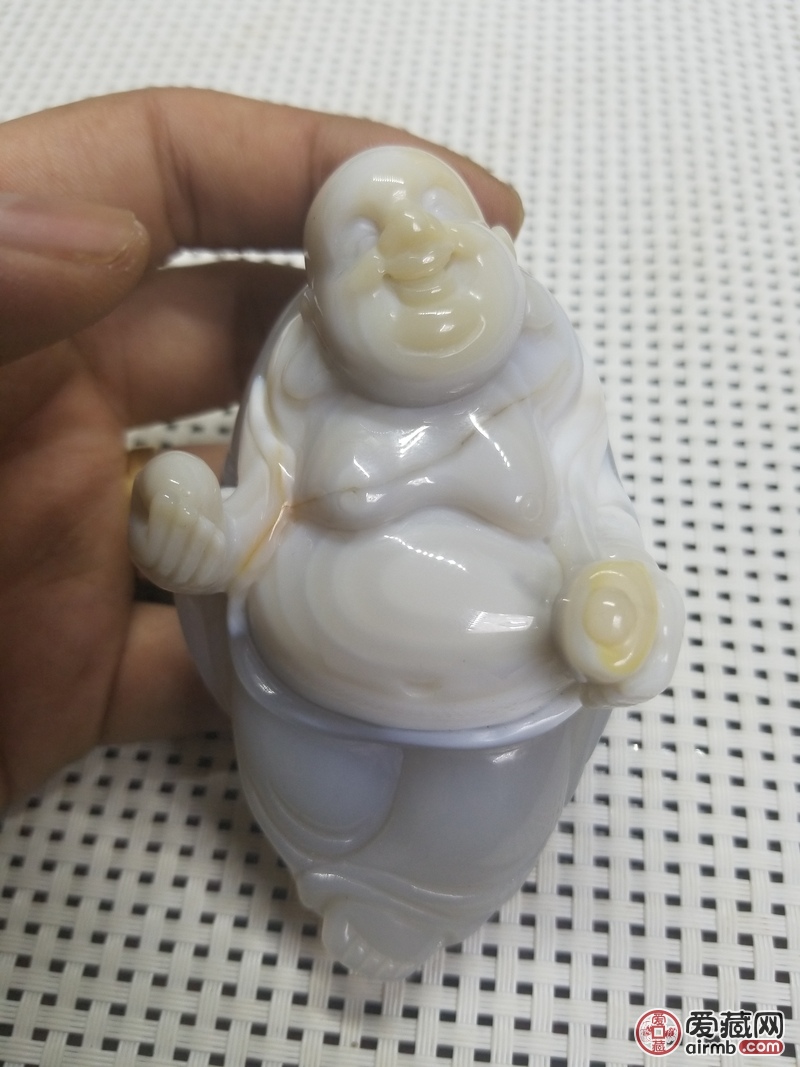 【拍品名称】俏色玛瑙手把件，（