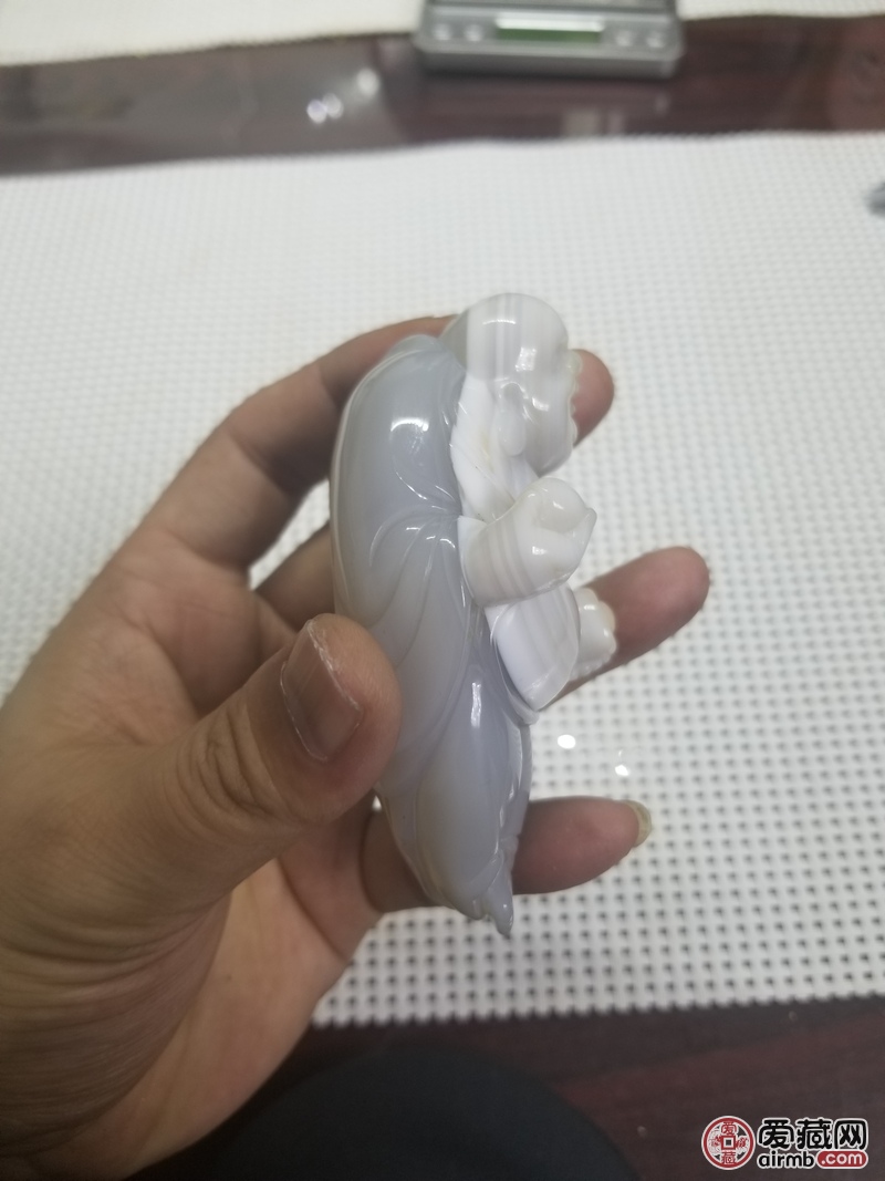 【拍品名称】俏色玛瑙手把件，（
