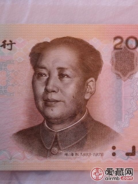 错版币，主席脸上的黑点是印刷时