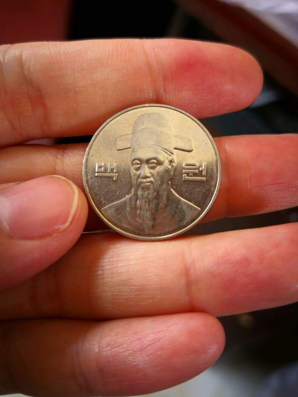 韩币100元一枚流通品品相好