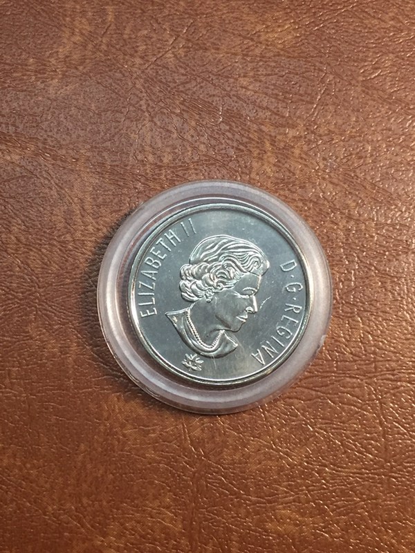 卷拆加拿大150周年纪念币