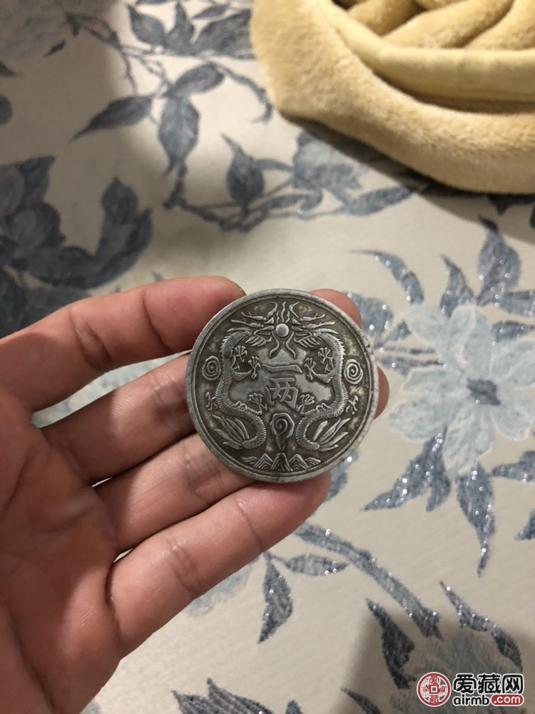 该件光绪银币双龙戏珠,是古币收
