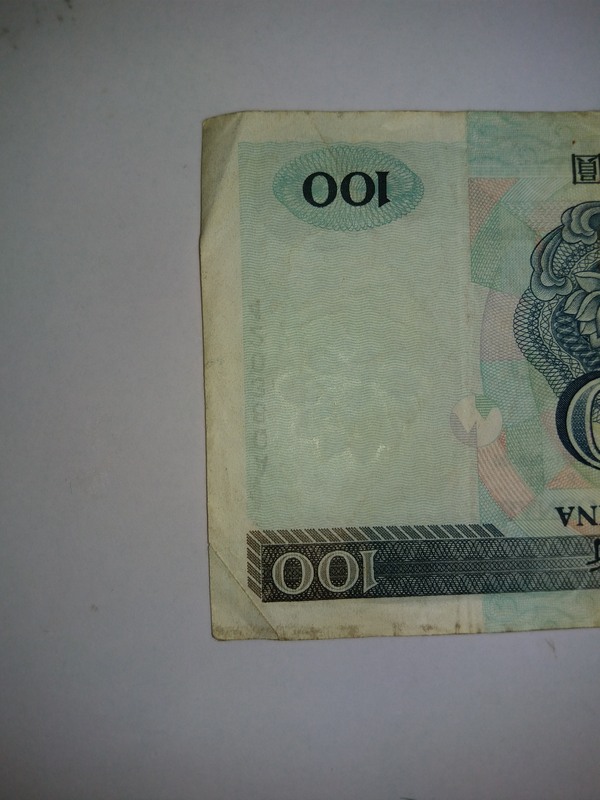 澳门币100元原票一张具体品相如图包原票配册好品