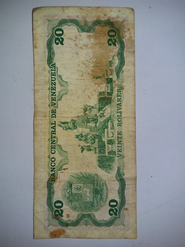 台币100元和玻利维亚20元各一张,具体品相如图包