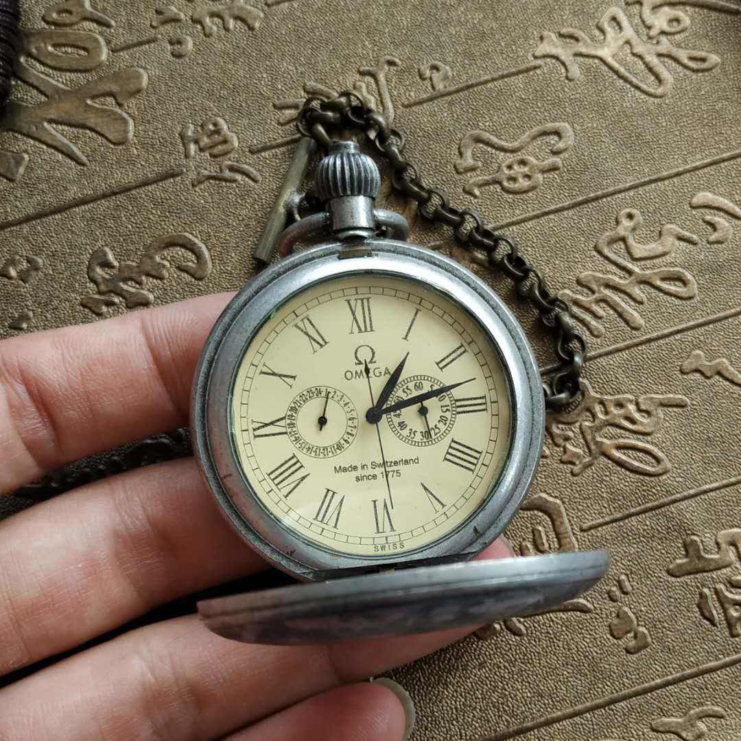 欧米茄藏银火车头经典机械怀表