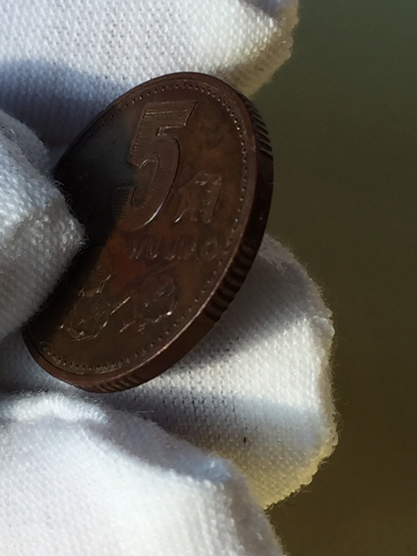 梅花5角通体包浆巧克力有玉化感觉整体包浆均匀难得难