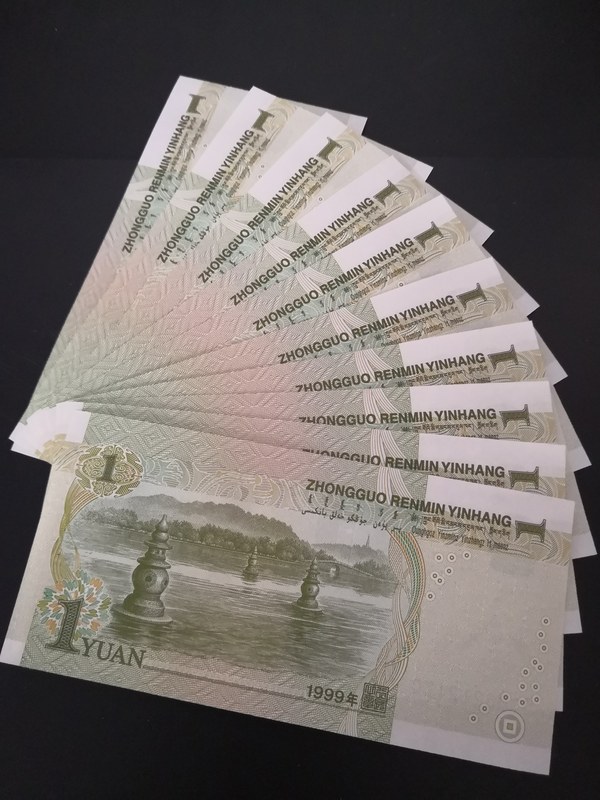 991早期背金沙刀拆标十出,此币不但是背金沙,而且