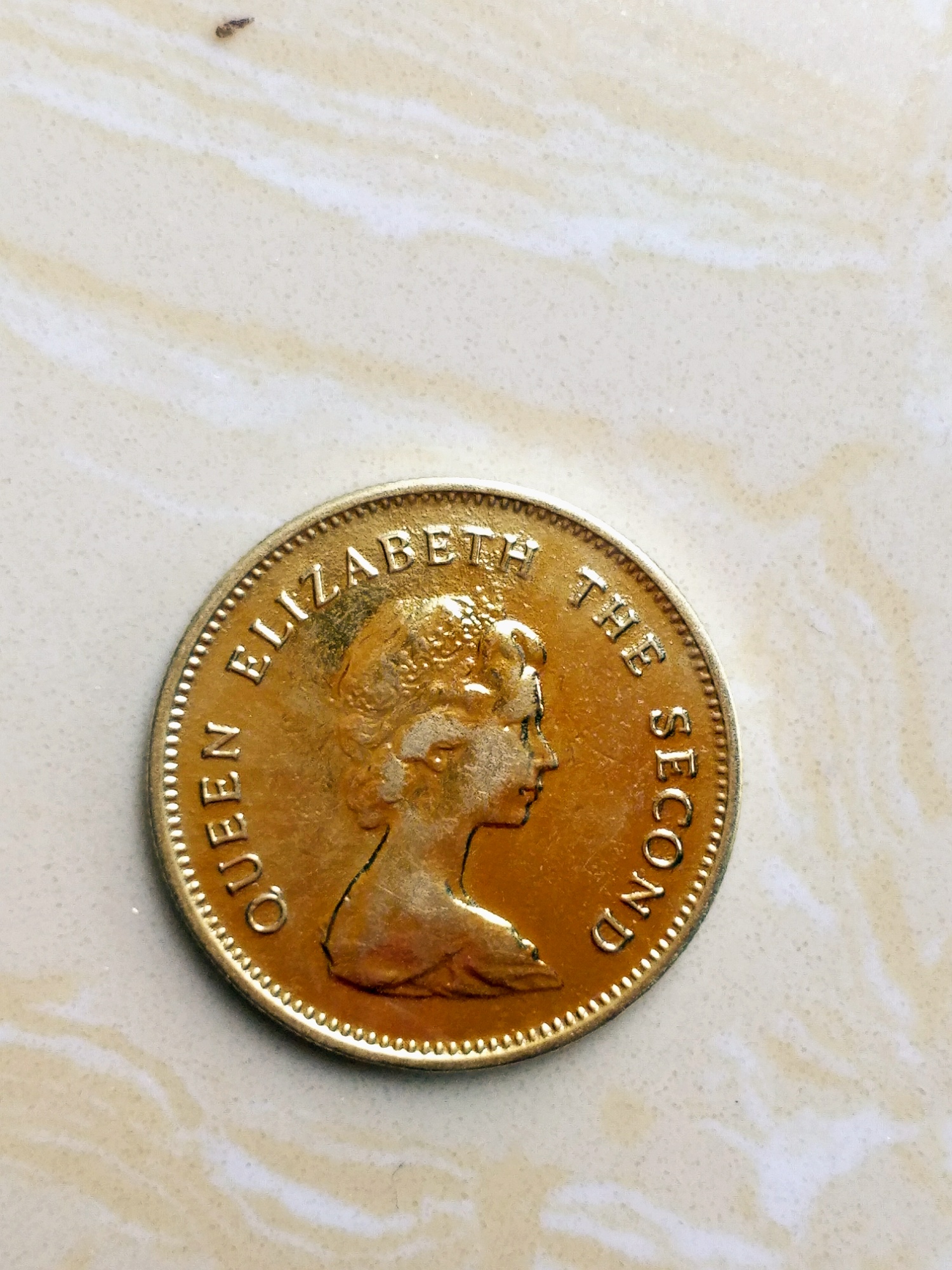 香港早期英国女王头像五毫养护硬币一枚,如图按图发货