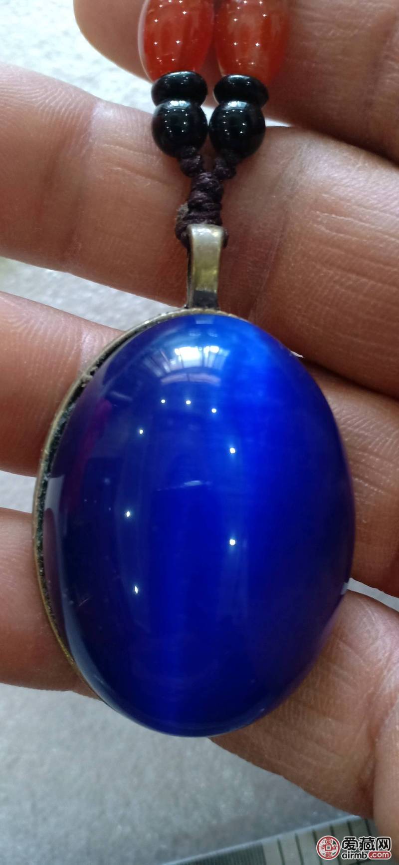 华夏美玉精品冰种蛋形猫眼石