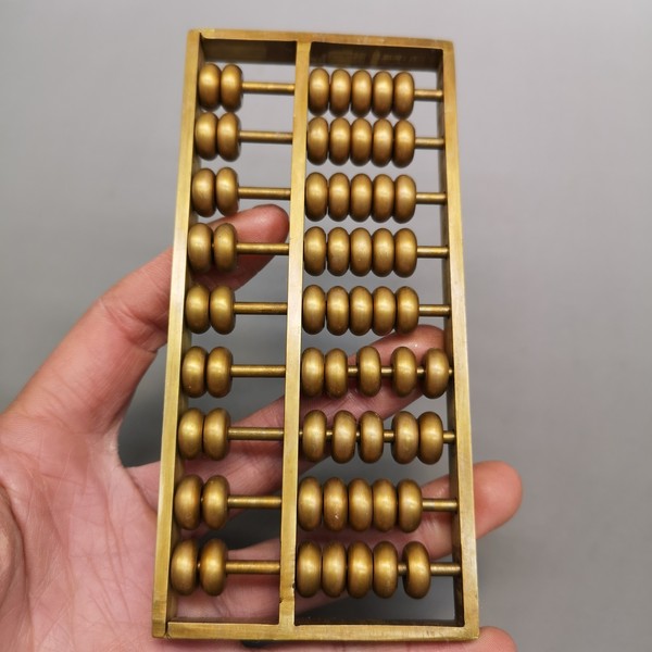 黄铜算盘器型厚重形制端正通体光素色泽雅致