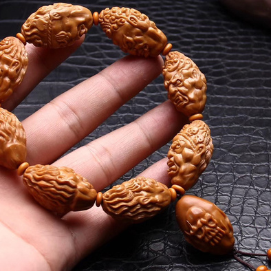 橄榄核手工雕刻不动明王精选黄胖核雕刻,雕刻霸气