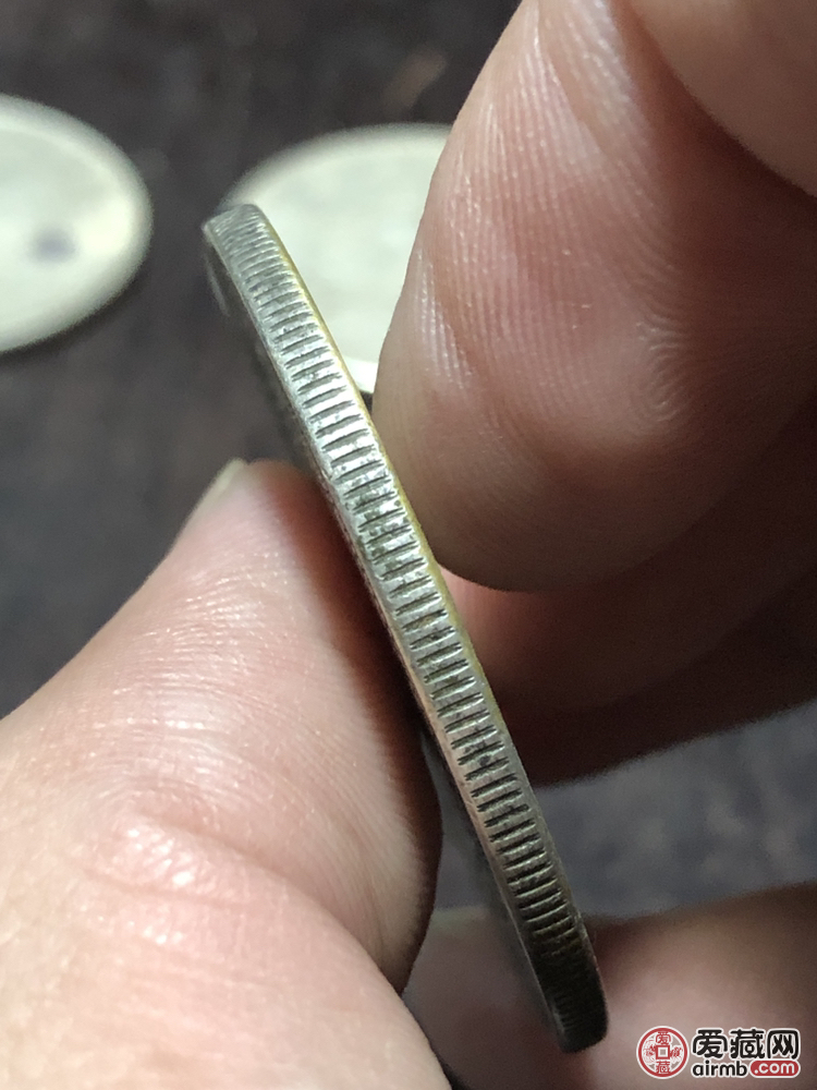 专家点评:齿边不符合鉴定结果:赝品藏品描述:造币总厂