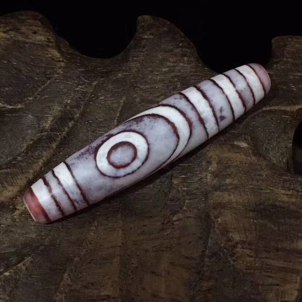 藏传鸡骨白两眼老天珠藏传鸡骨白两眼老天珠品相不