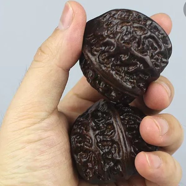 一对天然黑檀木木雕核桃单个直径5厘米一对的价格,偏