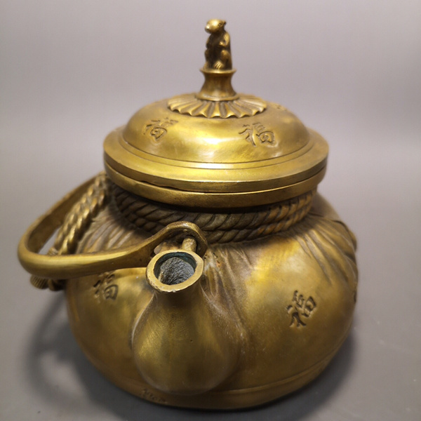 黄铜酒壶器型厚重做工精美形制端正包浆温润色