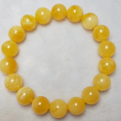 天然蜜蜡鸡油黄女款手串,无杂无裂,蜡质浓厚饱满,盘