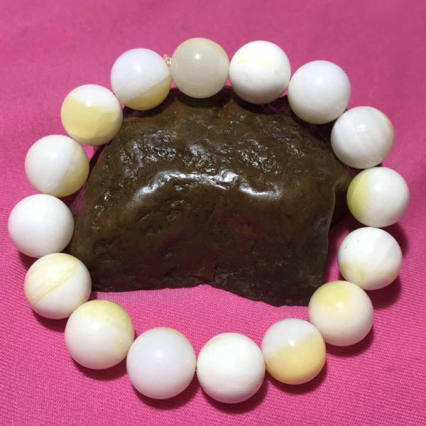 深海奶白飘黄贝化玉单圈手串一条直径12左右