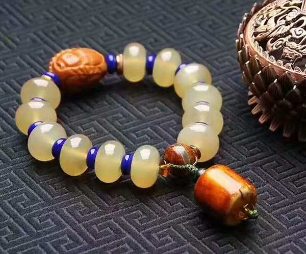 正宗纯天然西藏羚羊角盘珠单圈手串冰透黄料约16