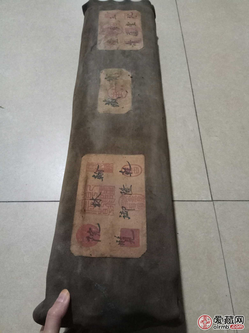 牛皮包裹密封画,内装8幅轴画