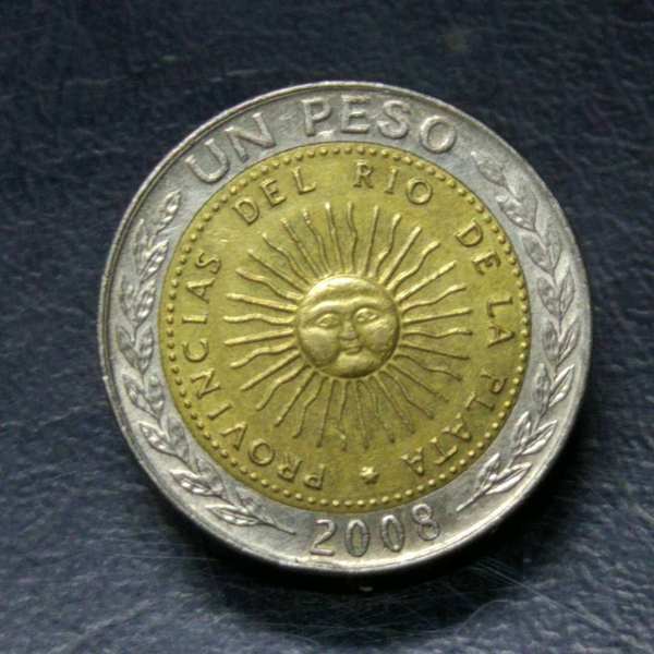 0元起拍阿根廷高值双色双金属硬币一枚实物拍摄