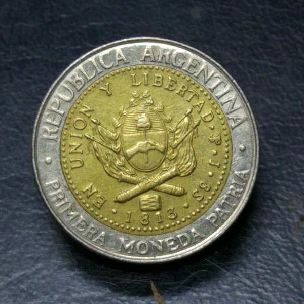 0元起拍阿根廷高值双色双金属硬币一枚实物拍摄