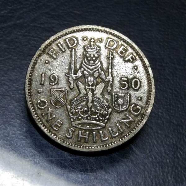 0元起拍,1950年英国一先令硬币一枚.保真,假一