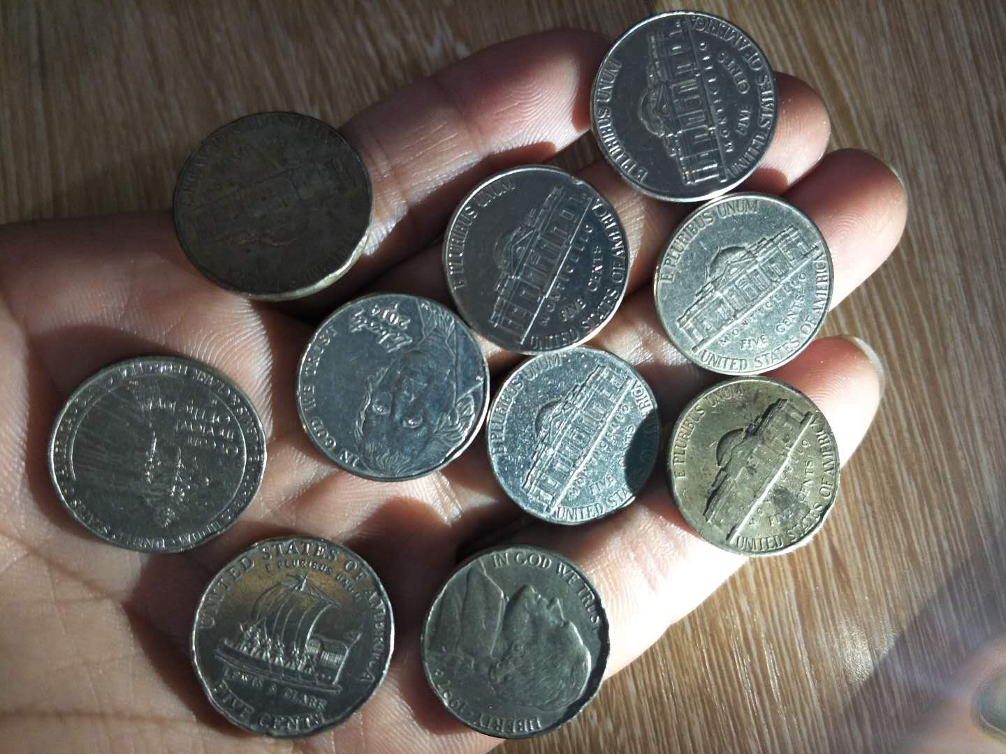 0起,美国五美分硬币10枚.按