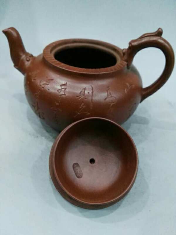 早期紫砂壶一把.底款王寅春.细节如图所示,此壶采用