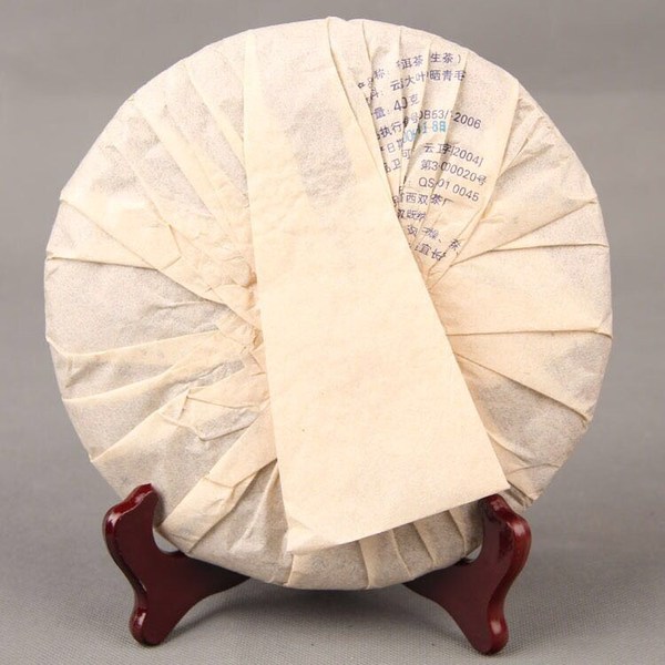 产品名称孔雀之乡七子饼茶生茶产品原